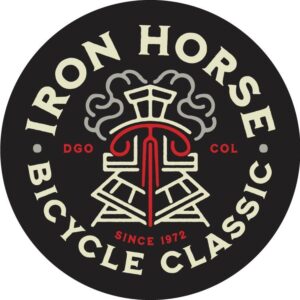 Circular logo for the Iron Horse Bicycle Classic with a stylized train graphic in the center, "DGO" and "COL" on each side, and "Since 1972" at the bottom. Text surrounds the image on a black background.
